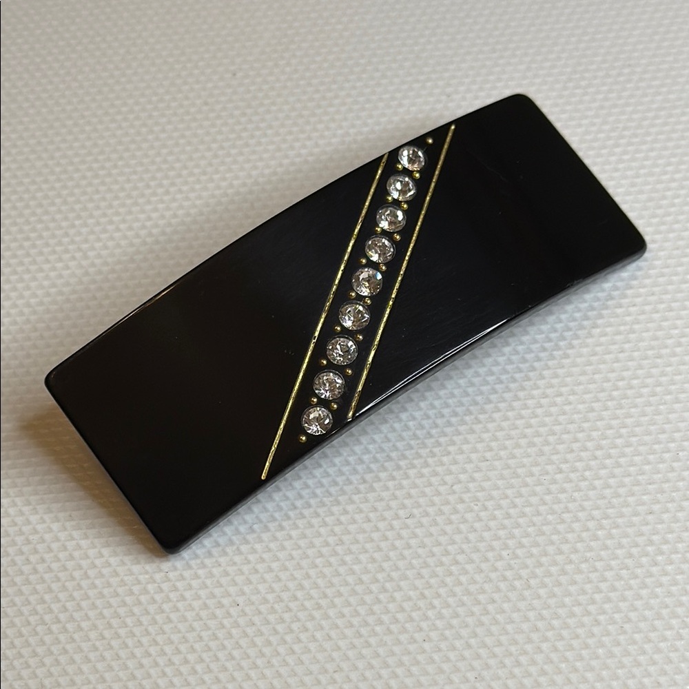 Elegant Black Hair Clip with Gold Accents